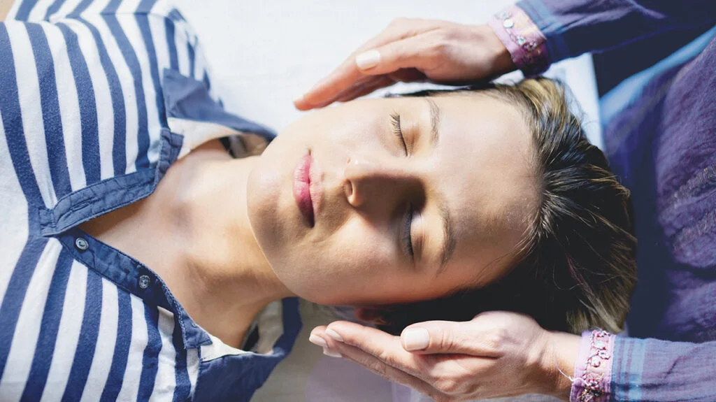 Woman in a reiki session